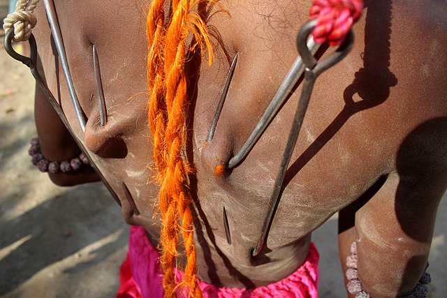 Piercing iron Charak puja